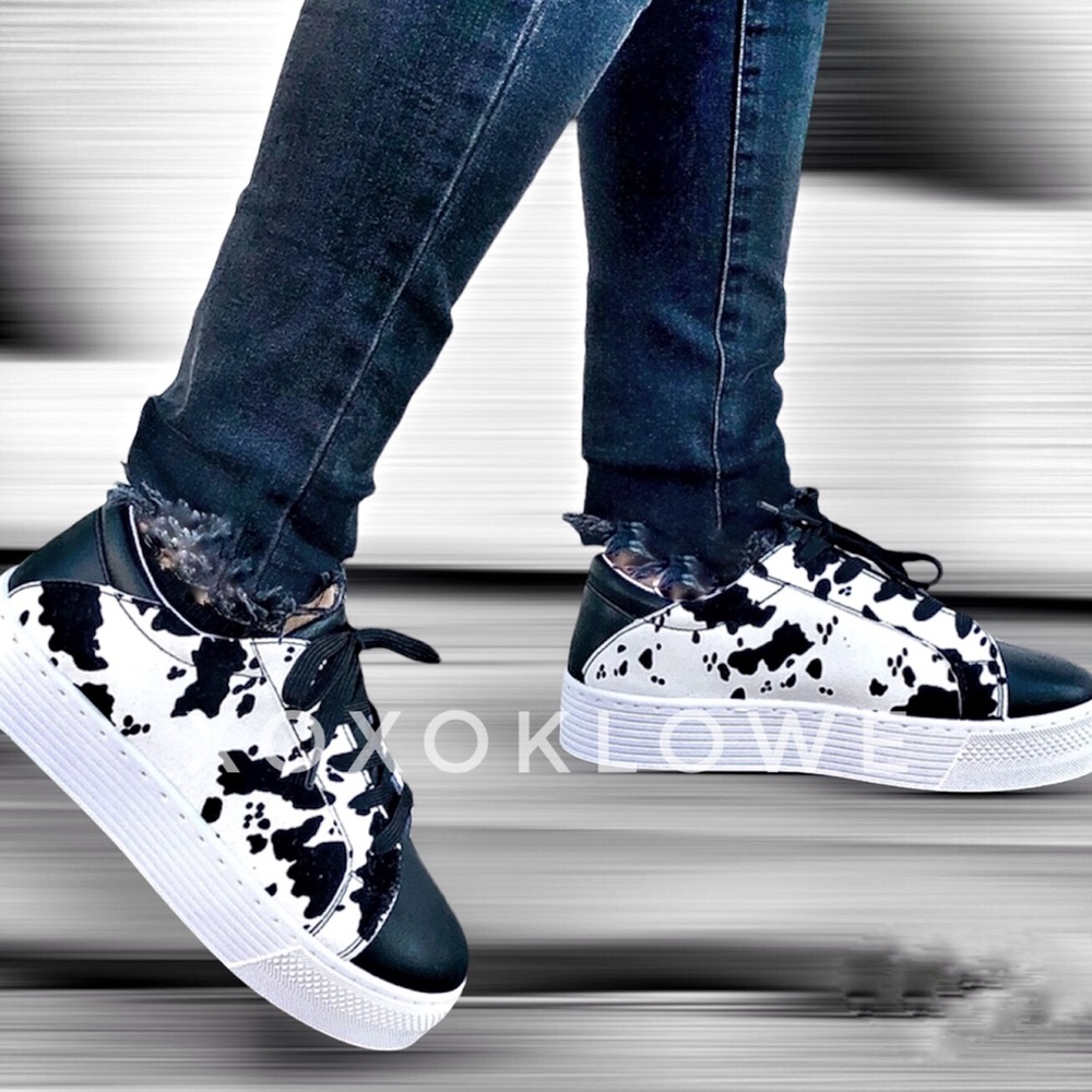 Cow print platform sneakers